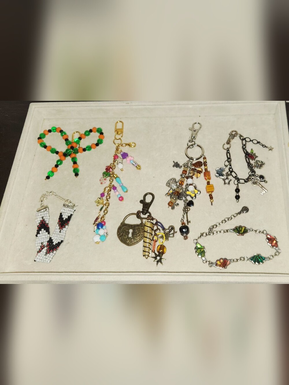 Women Jewely 4 Bag Charms,3 Braclets.